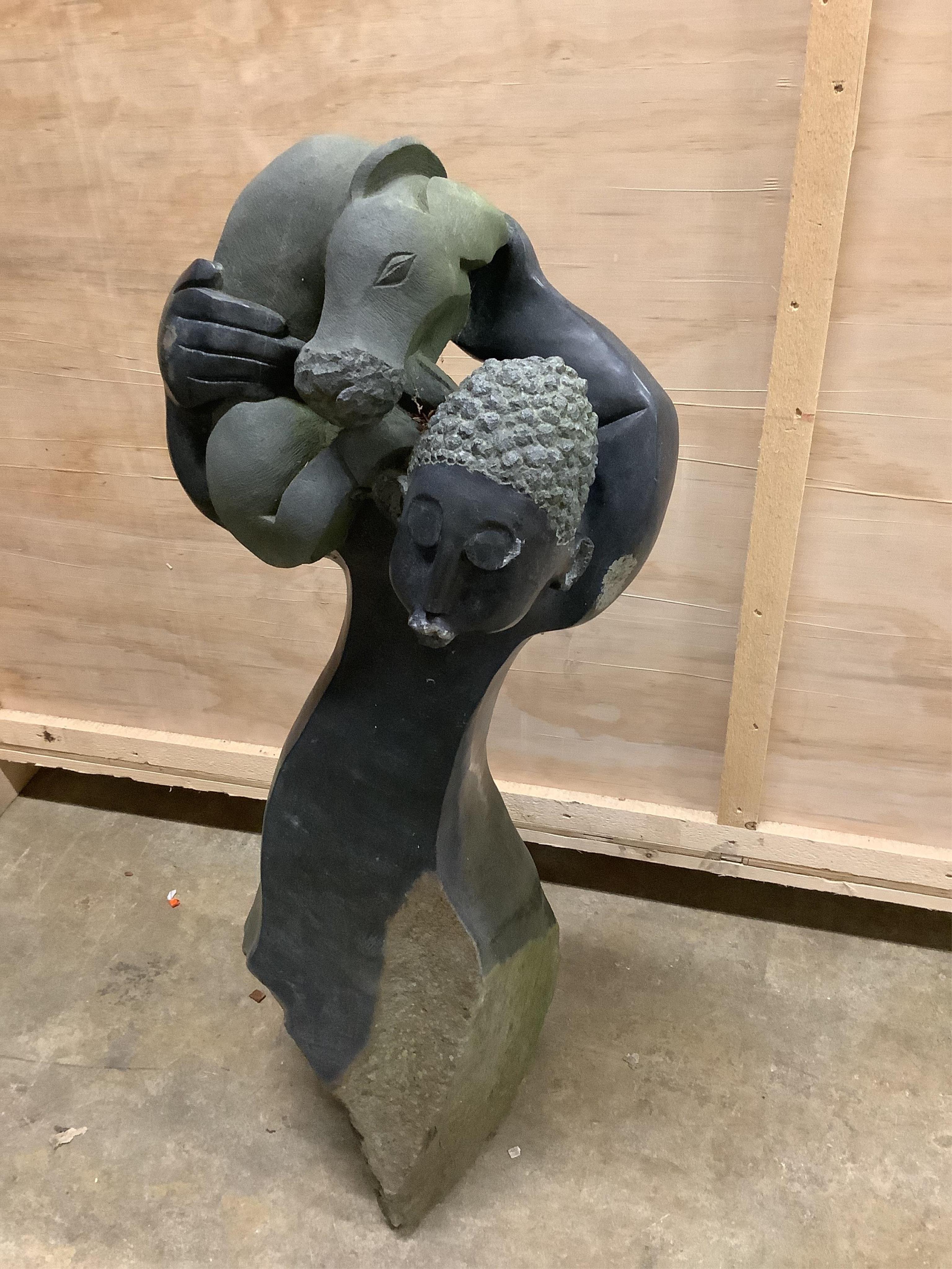 Garden sculpture by Tinei Mashaya - Zimbabwean, entitled 'The Gamekeeper' carved from springstone, height 113cm. Condition - fair